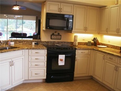 The beautifully remodeled kitchen features tile on the diagonal,