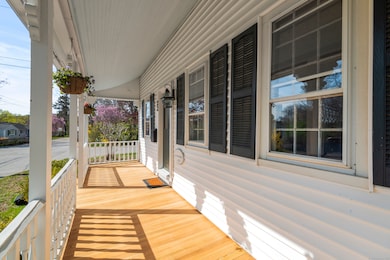 Charming front covered deck