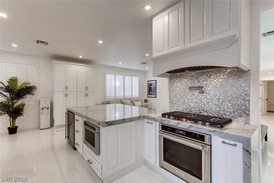 Kitchen with all new stainless steel appliances.