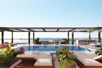 Island at West Bay Club - Roof top pool with wine 