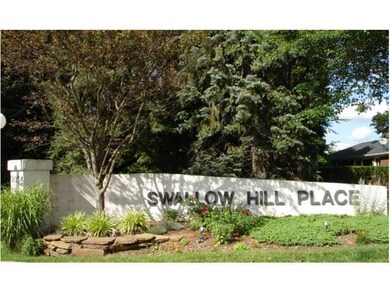 Exterior Front. The popular Swallow Hill Condomini