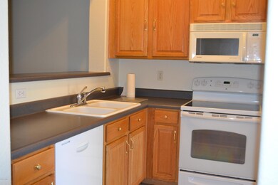 Kitchen with white appliances
