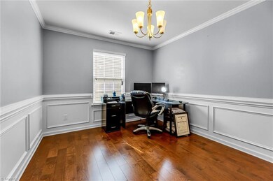 Dining room being used as an office.