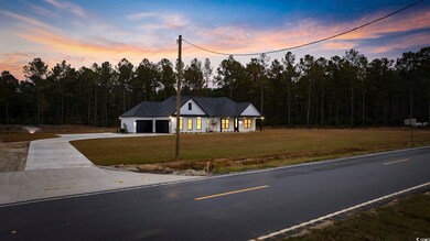 View of front of home with a lawn