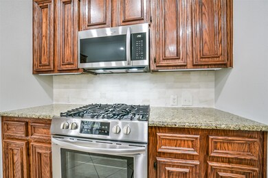 Stainless steel cooktop and new microwave.