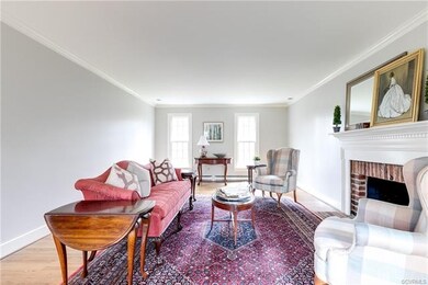 POSITIONED OFF THE FOYER AND DINING AREAS.  SYMMET
