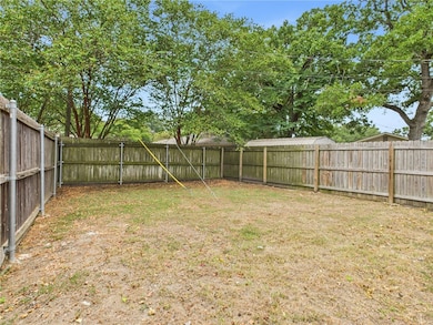 View of fenced backyard