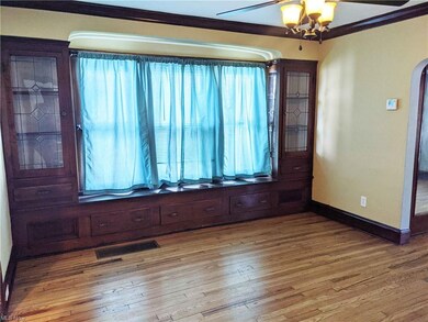 Spacious Dining Room with Built-in China Cabinets