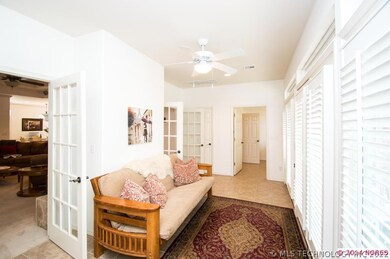 Nice shutter and French doors leading to the livin