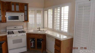 Kitchen cabinets have been freshly varnished.