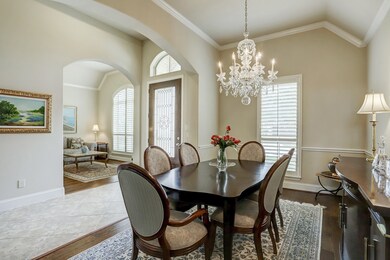 As you enter this home you are welcomed with a grand entry, high ceilings, and an abundance of natural light.