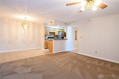 Living room facing dining/kitchen