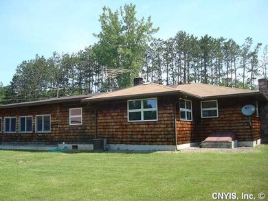 Exterior Back. Central air unit is new.