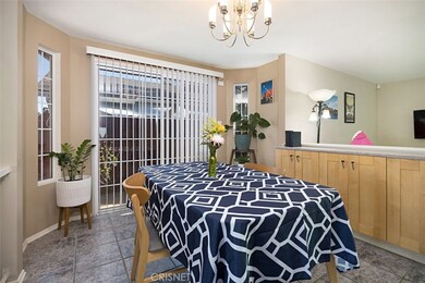 Dining room with glass doors and convenient storage cabinets