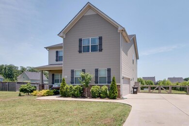 Plenty of parking is available for you and your guests. Notice the lovely custom landscaping...professionally installed and ready to enjoy!