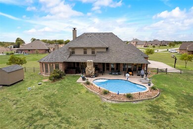 Salt water pool and shed in the fenced yard