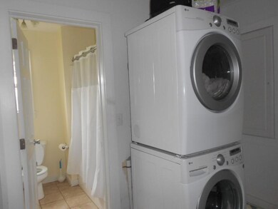 Laundry area and bath