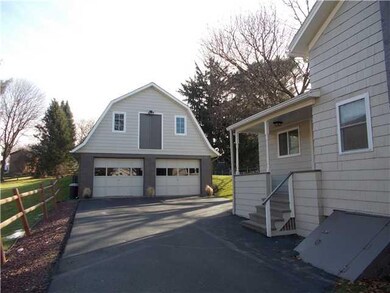 Exterior Front. Side porch, blacktop drive, walk-o