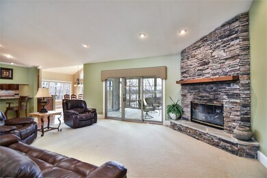 Living Room w/ Stone Fireplace