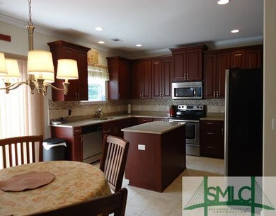 Kitchen. The breakfast room opens to the kitchen, 