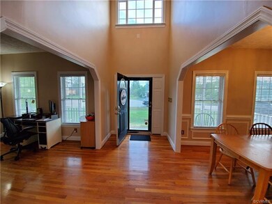 Foyer.  You're going to love these hardwood floors.  So warm, inviting and easy to keep clean.