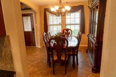 Dining room leads into kitchen