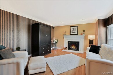 This home has three fireplaces. This one in the li