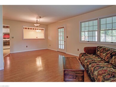 Dining section open to living room with a pass thr