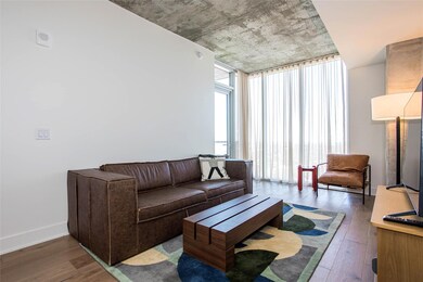 Living room featuring hardwood / wood-style floor