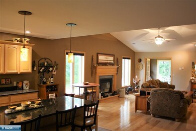 Maple Flooring , Vaulted Ceilings, Gas Fireplace