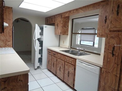 Galley Kitchen, plenty of cupboards plus pantry.