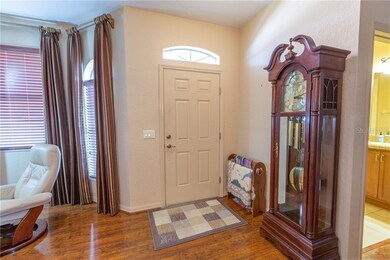 Foyer as you enter the villa.  Drapes are all cust