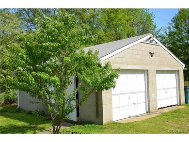 True 2-car detached cinderblock garage with electr