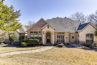 French country style house with a front lawn
