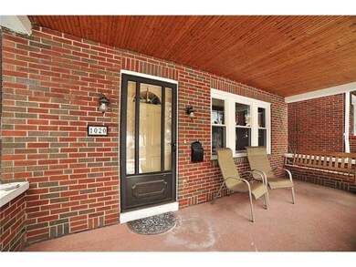 Exterior Front. Pleasant front porch on quiet stre
