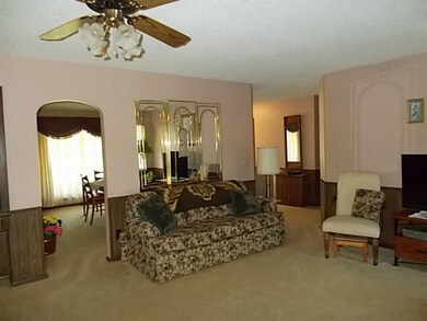 Exterior Front. Den looking into formal dining and