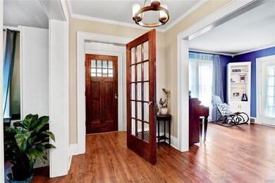 Entrance into the home, solid wood doors and glass