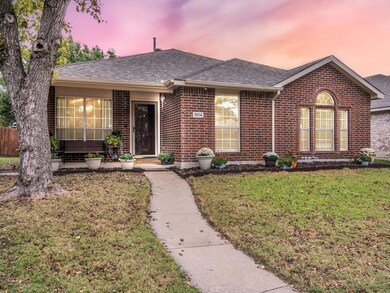 Single story home with a lawn