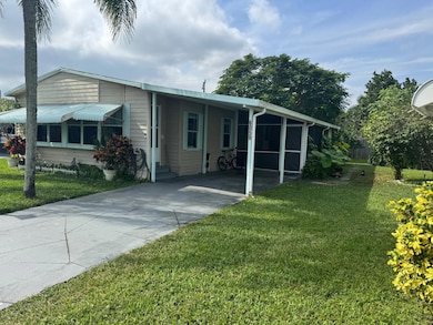 6059 Palm Harbour Dr unit 6059, Atlantis, FL 33462 - photo 2