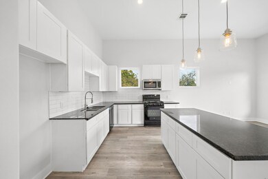 9705 Beckley St, Houston, TX 77088 - photo 7