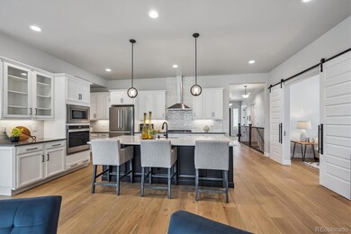 8890 S Quatar Ct, Aurora, CO 80016 - photo 4