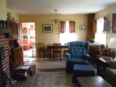Living/dining room looking into kitchen.
