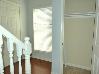 Enter from the covered front porch into foyer with