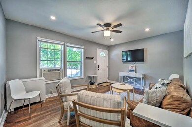 Living area featuring ceiling fan, recessed light
