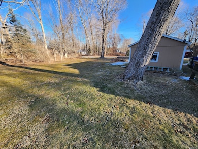 Side yard .11 that has well on it