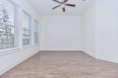 Large living room with lots of windows