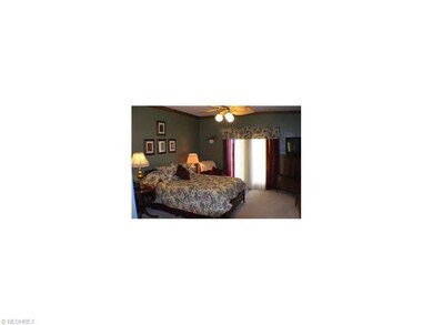Large Master Bedroom and with full length glass fr