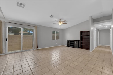Unfurnished living room with lofted ceiling, light