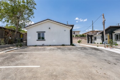 View of property exterior featuring uncovered park