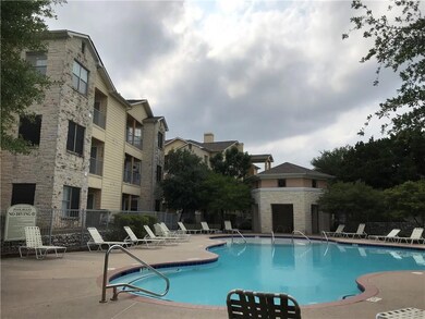 Community pool with a patio area